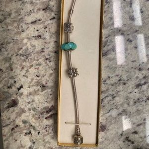 PANDORA silver charm bracelet with charms